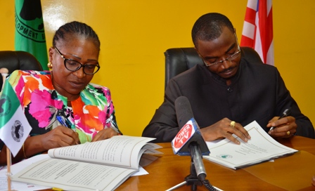 Dr. Margaret Kilo Resident Representative AFDB and Hon. Boima S. Kamara Finance and Development Planning Minister 2