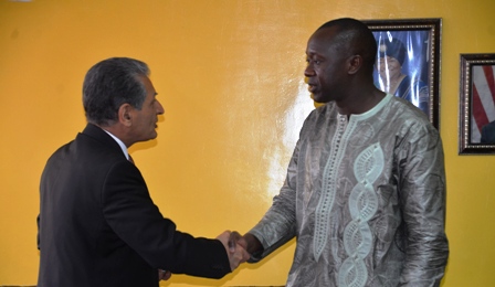 Finance and Development Planning Minister exchange hand shake with United Nations Secretary General of the Special Representative to Liberia